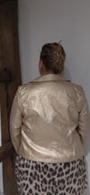 Veste simili doré